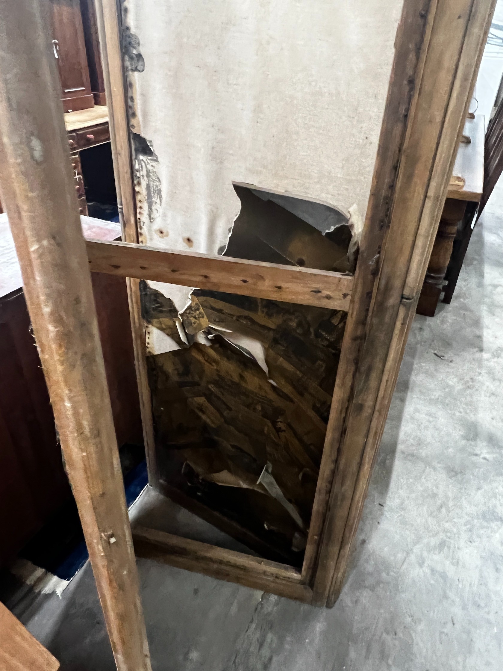 A Victorian pine and beech four fold dressing screen, in need of re-upholstery, each panel width 70cm height 194cm